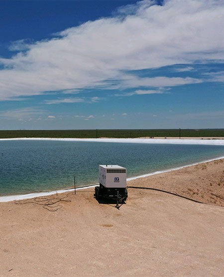 Large pit constructed by 3G Construction filled with water.